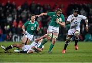 30 January 2015; Iain Henderson, Ireland Wolfhounds, is tackled by Henry Slade, England Saxons, as Maro Itoje approaches. Ireland Wolfhounds v England Saxons, International Friendly. Irish Independent Park, Cork.  Picture credit: Matt Browne / SPORTSFILE