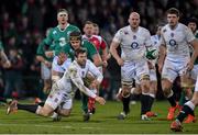 30 January 2015; Elliot Daly, England Saxons, releases the ball before being tackled by Iain Henderson, Ireland Wolfhounds. Ireland Wolfhounds v England Saxons, International Friendly. Irish Independent Park, Cork.  Picture credit: Matt Browne / SPORTSFILE