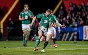30 January 2015; Keith Earls, Ireland Wolfhounds, breaks through the tackle of Elliot Daly, England Saxons. Ireland Wolfhounds v England Saxons, International Friendly. Irish Independent Park, Cork.  Picture credit: Matt Browne / SPORTSFILE