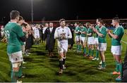 30 January 2015; The England Saxons team are led off the pitch by Elliot Daly. Ireland Wolfhounds v England Saxons, International Friendly. Irish Independent Park, Cork.  Picture credit: Matt Browne / SPORTSFILE