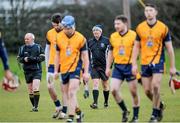 29 January 2015; Referee Brian Gavin and DCU players leave the field after the game. Independent.ie Fitzgibbon Cup, Group A, Round 1, DCU v Cork IT. Dublin City University, Dublin. Picture credit: Piaras Ó Mídheach / SPORTSFILE