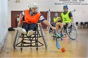 31 January 2015: Sarah Cregg, Roscommon, in action against Colm Foley, St. Peregrines. M. Donnelly GAA Wheelchair Hurling Blitz/All-Star Awards, St. Peregrines GAA Club, Blakestown Road, Dublin.  Picture credit: Barry Cregg / SPORTSFILE