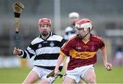 31 January 2015: Caibhin O Geallabhain, Kilkenny CBS, in action against Niall Walsh, St Kieran's College. Leinster Post Primary Schools Senior Hurling A, Quarter-Final, Kilkenny CBS v St Kieran's College. Nowlan Park, Kilkenny. Picture credit: Pat Murphy / SPORTSFILE
