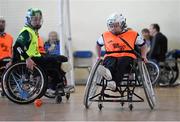 31 January 2015: Sarah Cregg, Roscommon, in action against Alex Hennebry, Waterford. M. Donnelly GAA Wheelchair Hurling Blitz/All-Star Awards, St. Peregrines GAA Club, Blakestown Road, Dublin.  Picture credit: Barry Cregg / SPORTSFILE