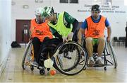 31 January 2015: Alex Hennebry, centre, Waterford, in action against Part Carty, left, Sligo, and Damien Cauley, St. Peregrines. M. Donnelly GAA Wheelchair Hurling Blitz/All-Star Awards, St. Peregrines GAA Club, Blakestown Road, Dublin.  Picture credit: Barry Cregg / SPORTSFILE