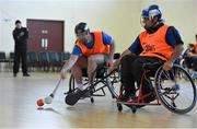 31 January 2015: Sultan Kakar, right, Limerick, in action against Damian Cauley, St. Peregrines. M. Donnelly GAA Wheelchair Hurling Blitz/All-Star Awards, St. Peregrines GAA Club, Blakestown Road, Dublin.  Picture credit: Barry Cregg / SPORTSFILE
