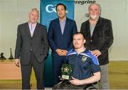 31 January 2015: Stephen Melvin, Sligo, receives his Midfield of the Year award from Paul Harte, left, Chairman of St. Peregrines GAA Club; Leo Varadkar, TD, Minister for Health; and Martin Donnelly, M. Donnelly. GAA Wheelchair Hurling Blitz/All-Star Awards, St. Peregrines GAA Club, Blakestown Road, Dublin.  Picture credit: Barry Cregg / SPORTSFILE