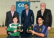 31 January 2015:Alex Hennebry, left, Limerick, and Sultan Kakar, receive their Forwards of the Year awards from Paul Harte, left, Chairman of St. Peregrines GAA Club; Leo Varadkar, TD, Minister for Health; and Martin Donnelly, M. Donnelly. GAA Wheelchair Hurling Blitz/All-Star Awards, St. Peregrines GAA Club, Blakestown Road, Dublin.  Picture credit: Barry Cregg / SPORTSFILE