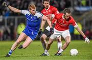 31 January 2015: Ronan McNamee, Tyrone, in action against Kieran Hughes, Monaghan. Allianz Football League Division 1, Round 1, Tyrone v Monaghan. Healy Park, Omagh, Co. Tyrone Photo by Sportsfile