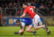 31 January 2015: Dermot Malone, Monaghan, in action against Barry Tierney, Tyrone. Allianz Football League Division 1, Round 1, Tyrone v Monaghan. Healy Park, Omagh, Co. Tyrone Photo by Sportsfile