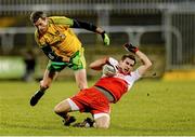 31 January 2015: Benny Heron, Derry, in action against Christy Toye, Donegal. Allianz Football League Division 1, Round 1, Donegal v Derry. MacCumhail Park, Ballybofey, Co. Donegal Picture credit: Oliver McVeigh / SPORTSFILE