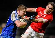 31 January 2015: Dermot Malonme, Monaghan, in action against Ronan McNamee, Tyrone. Allianz Football League Division 1, Round 1, Tyrone v Monaghan. Healy Park, Omagh, Co. Tyrone Photo by Sportsfile