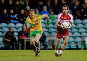 31 January 2015: Benny Heron, Derry, in action against Hugh McFadden, Donegal. Allianz Football League Division 1, Round 1, Donegal v Derry. MacCumhail Park, Ballybofey, Co. Donegal Picture credit: Oliver McVeigh / SPORTSFILE