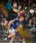 1 February 2015; Evan Regan, Mayo, contests a high ball with Johnny Buckley, left, and Mark Griffin, Kerry. Regan was subsequently taken off on a stretcher as a result of the fall. Allianz Football League, Division 1, Round 1, Kerry v Mayo. Fitzgerald Stadium, Killarney, Co. Kerry.  Picture credit: Brendan Moran / SPORTSFILE