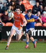 1 February 2015; Aaron Findon, Armagh, in action against Robbie Kiely, Tipperary. Allianz Football League, Division 3, Round 1, Armagh v Tipperary. Athletic Grounds, Armagh. Picture credit: Oliver McVeigh / SPORTSFILE