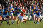 1 February 2015; Mark Shields, Armagh, in action against Robbie Kiely, Colin O'Riordain and George Hannigan, Tipperary. Allianz Football League, Division 3, Round 1, Armagh v Tipperary. Athletic Grounds, Armagh. Picture credit: Oliver McVeigh / SPORTSFILE