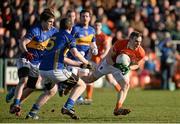 1 February 2015; Mark Shields, Armagh, in action against Robbie Kiely and Seamus Kennedy, Tipperary. Allianz Football League, Division 3, Round 1, Armagh v Tipperary. Athletic Grounds, Armagh. Picture credit: Oliver McVeigh / SPORTSFILE