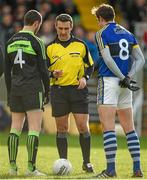 1 February 2015; Referee Maurice Deegan performs the coin toss between team captains Keith Higgins, left, Mayo, and David Moran, Kerry. Allianz Football League, Division 1, Round 1, Kerry v Mayo. Fitzgerald Stadium, Killarney, Co. Kerry.  Picture credit: Brendan Moran / SPORTSFILE