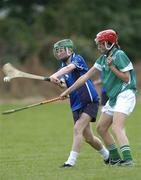 21 October 2007; Brid Twomey, Munster, in action against Jacinta Goonery, Leinster. Gael Linn Junior Inter-Provincial Championship Camogie Final, Leinster v Munster, Russell Park, Blanchardstown, Dublin. Picture credit: Ray Lohan / SPORTSFILE