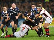 26 October 2007; Ollie Le Roux, Leinster, is tackled by Kieron Dawson and Bryan Young, Ulster. Magners League, Ulster v Leinster, Ravenhill, Belfast, Co. Antrim. Picture credit; Oliver McVeigh / SPORTSFILE