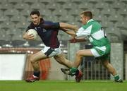 26 October 2007; Ger Heneghan, AIB Group, in action against Padraig Murphy, Defence Forces. 25th Anniversary Annual Representative Football Match, AIB Group v Defence Forces, Croke Park, Dublin. Picture credit: Pat Murphy / SPORTSFILE