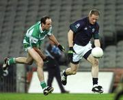 26 October 2007; Comann Goggins, AIB Group, in action against Dermot Earley, Defence Forces. 25th Anniversary Annual Representative Football Match, AIB Group v Defence Forces, Croke Park, Dublin. Picture credit: Pat Murphy / SPORTSFILE