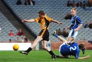 27 October 2007; Thomas Freeman, Ulster, shoots to score his sides first goal despite the efforts of Thomas O'Gorman, Munster. M. Donnelly Inter-Provincial Football Championships Final, Munster v Ulster, Croke Park, Dublin. Picture credit: Stephen McCarthy / SPORTSFILE