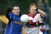 28 October 2007; Alan Byrne, Eire Og, in action against Shaun Martin,Tullamore. Leinster Club Football Championship, Eire Og v Tullamore, Dr Cullen Park, Carlow. Picture credit; Ray Lohan / SPORTSFILE