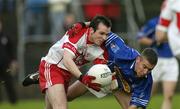 28 October 2007; Keith Moran, Eire Og, in action against Kevin Duffy, Tullamore. Leinster Club Football Championship, Eire Og v Tullamore, Dr Cullen Park, Carlow. Picture credit; Ray Lohan / SPORTSFILE