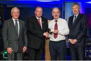 23 January 2015; Noel Kelly, from Clare, second right, is presented with his Croke Park Voluntary Stewards award by, from left, Chief Steward Michael Leddy, Uachtarán Chumann Lúthchleas Gael Liam Ó Néill and Ard Stiúrthóir of GAA Páraic Duffy during the Croke Park Annual Stewards Dinner. Croke Park, Dublin. Picture credit: Tomas Greally / SPORTSFILE