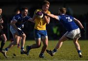 1 February 2015; Enda Smith, Roscommon, in action against Damien O'Reilly, left, and Rory Dunne, Cavan. Allianz Football League, Division 2, Round 1, Roscommon v Cavan. Kiltoom, Co. Roscommon. Picture credit: Barry Cregg / SPORTSFILE