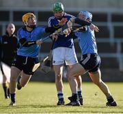 1 February 2015; Tommy Fitzgerald, Laois, in action against Paul Schutte, left, and Ross O'Carroll, Dublin. Bord na Mona Walsh Cup, Semi-Final, Laois v Dublin. O'Moore Park, Portlaoise, Co. Laois. Picture credit: Ray McManus / SPORTSFILE