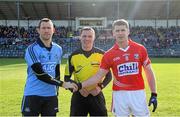 1 February 2015; Dublin captain Denis Bastick and Cork captain Fintan Goold exchange a handshake in the company of referee Rory Hickey before the game. Allianz Football League, Division 1, Round 1, Cork v Dublin, Páirc Uí Rinn, Cork. Picture credit: Eoin Noonan / SPORTSFILE