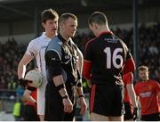 1 February 2015; Pádraig Fogarty, Kildare, questions referee Anthony Nolan, as he waits for Down substitute goalkeeper Stephen Kane to prepare for a penalty, that he saved. Allianz Football League Division 2 Round 1, Kildare v Down. St Conleth's Park, Newbridge, Co. Kildare. Picture credit: Piaras Ó Mídheach / SPORTSFILE