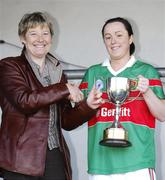 28 October 2007; The Carnacon captain Caroline McGing is presented with the cup by Mary Quinn, President, Connacht Council. VHI Healthcare Connacht Senior Club Football Championship Final, Corofin, Galway, v Carnacon, Mayo, GAA Grounds, Corofin, Galway. Picture credit: Ray McManus / SPORTSFILE