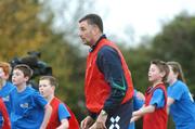 31 October 2007; Former Republic of Ireland International John Aldridge with children from Dublin’s Docklands during the third Docklands Soccer Camp & Mini World Cup Tournament. ALSAA, Dublin Airport, Dublin. Picture credit: Caroline Quinn / SPORTSFILE  *** Local Caption ***