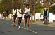 29 October 2007; Runners, from right to left, Zongamele Dyubeni, from South Africa, Stanley Teimet and Ernest Kibor, both from Kenya, in action during the adidas Dublin City Marathon 2007, Merrion Square, Dublin. Picture credit: Stephen McCarthy / SPORTSFILE