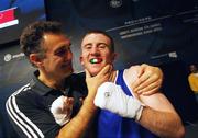 31 October 2007; Paddy Barnes, Belfast, Northern Ireland, celebrates at the end of the fight with head coach Billy Walsh his victory over Kenji Ohkubo, Japan, and qualifing for the Olympics in Beijing 2008. AIBA World Boxing Championships Chicago 2007, Light Fly 48 kg, Paddy Barnes.v.Kenji Ohkubo, University of Illinois, Chicago Pavilion, Chicago, USA. Picture credit: David Maher / SPORTSFILE