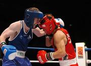 31 October 2007; Paddy Barnes, left, Belfast, Northern Ireland, in action against Kenji Ohkubo, Japan. AIBA World Boxing Championships Chicago 2007, Light Fly 48 kg, Paddy Barnes.v.Kenji Ohkubo, University of Illinois, Chicago Pavilion, Chicago, USA. Picture credit: David Maher / SPORTSFILE