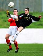 3 November 2007; Larne's Paul Hamilton clears the ball despite the intentions of Cliftonville's Chris Scannell. Carnegie Premier League, Cliftonville v Larne, Solitude, Belfast, Co. Antrim. Picture credit; Peter Morrison / SPORTSFILE