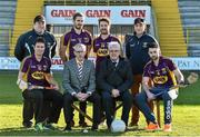 4 February 2015; Denis Herlihy, Commercial Manager Glanbia Agri / Gain Feeds, and Diarmuid Devereux, Chairman of the Wexford County Board, with back row, from left, Wexford football manager David Power, footballer's Brain Malone and Ben Brosnan, and hurling manager Liam Dunne; front row, Wexford hurler's Paul Morris, left, and Eoin Moore during the Wexford GAA 2015 Glanbia Agri / Gain sponsorship launch. Wexford Park, Wexford. Picture credit: Matt Browne / SPORTSFILE