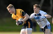 4 February 2015; Conor McGraynor, DCU, in action against Killlian Clarke, UUJ. Independent.ie Sigerson Cup, Round 1, UUJ v DCU. University of Ulster Jordanstown, Jordanstown, Co. Antrim Picture credit: Oliver McVeigh / SPORTSFILE