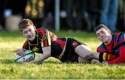 4 February 2015; Darragh O'Gorman, Ardscoil Rís, scores his side's third try despite the efforts of Conal Broderick, St Munchin's College. SEAT Munster Schools Junior Cup, Round 1, St Munchin's College v Ardscoil Rís. St Mary's RFC, Limerick. Picture credit: Diarmuid Greene / SPORTSFILE