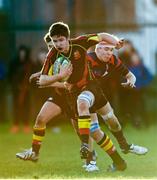 4 February 2015; Cameron Crowe, Ardscoil Rís, is tackled by Jake Murhphy, St Munchin's College. SEAT Munster Schools Junior Cup, Round 1, St Munchin's College v Ardscoil Rís. St Mary's RFC, Limerick. Picture credit: Diarmuid Greene / SPORTSFILE