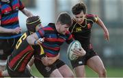 4 February 2015; Mark Crowe, St Munchin's College, is tackled by John Taylor, left, and Aaron Walshe, Ardscoil Rís. SEAT Munster Schools Junior Cup, Round 1, St Munchin's College v Ardscoil Rís. St Mary's RFC, Limerick. Picture credit: Diarmuid Greene / SPORTSFILE