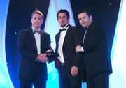 2 November 2007; Paul Galvin of Kerry is presented with his award by Dave Sheerin, left, MD, Opel Ireland, in the company of Dessie Farrell, Chief Executive of the GPA, at the 2007 Opel GPA Player of the Year Awards. Gaelic Player Assoication Awards, Citywest Hotel, Conference, Leisure & Golf Resort, Saggart, Co. Dublin. Picture credit: Brendan Moran / SPORTSFILE  *** Local Caption ***