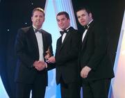 2 November 2007; Thomas Freeman of Monaghan is presented with his award by Dave Sheerin, left, MD, Opel Ireland, in the company of Dessie Farrell, Chief Executive of the GPA, at the 2007 Opel GPA Player of the Year Awards. Gaelic Player Assoication Awards, Citywest Hotel, Conference, Leisure & Golf Resort, Saggart, Co. Dublin. Picture credit: Brendan Moran / SPORTSFILE  *** Local Caption ***