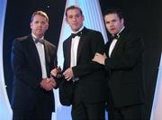 2 November 2007; Ken McGrath of Waterford is presented with his award by Dave Sheerin, left, MD, Opel Ireland, in the company of Dessie Farrell, Chief Executive of the GPA, at the 2007 Opel GPA Player of the Year Awards. Gaelic Player Assoication Awards, Citywest Hotel, Conference, Leisure & Golf Resort, Saggart, Co. Dublin. Picture credit: Brendan Moran / SPORTSFILE  *** Local Caption ***
