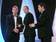 2 November 2007; James 'Cha' Fitzpatrick of Kilkenny is presented with his award by Dave Sheerin, left, MD, Opel Ireland, in the company of Dessie Farrell, Chief Executive of the GPA, at the 2007 Opel GPA Player of the Year Awards. Gaelic Player Assoication Awards, Citywest Hotel, Conference, Leisure & Golf Resort, Saggart, Co. Dublin. Picture credit: Brendan Moran / SPORTSFILE  *** Local Caption ***