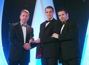2 November 2007; Michael Walsh of Waterford is presented with his award by Dave Sheerin, left, MD, Opel Ireland, in the company of Dessie Farrell, Chief Executive of the GPA, at the 2007 Opel GPA Player of the Year Awards. Gaelic Player Assoication Awards, Citywest Hotel, Conference, Leisure & Golf Resort, Saggart, Co. Dublin. Picture credit: Brendan Moran / SPORTSFILE  *** Local Caption ***